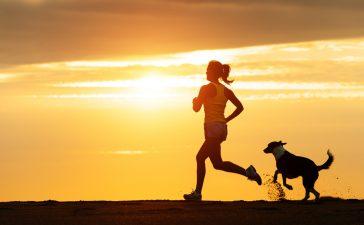 Running with her four-legged friend.